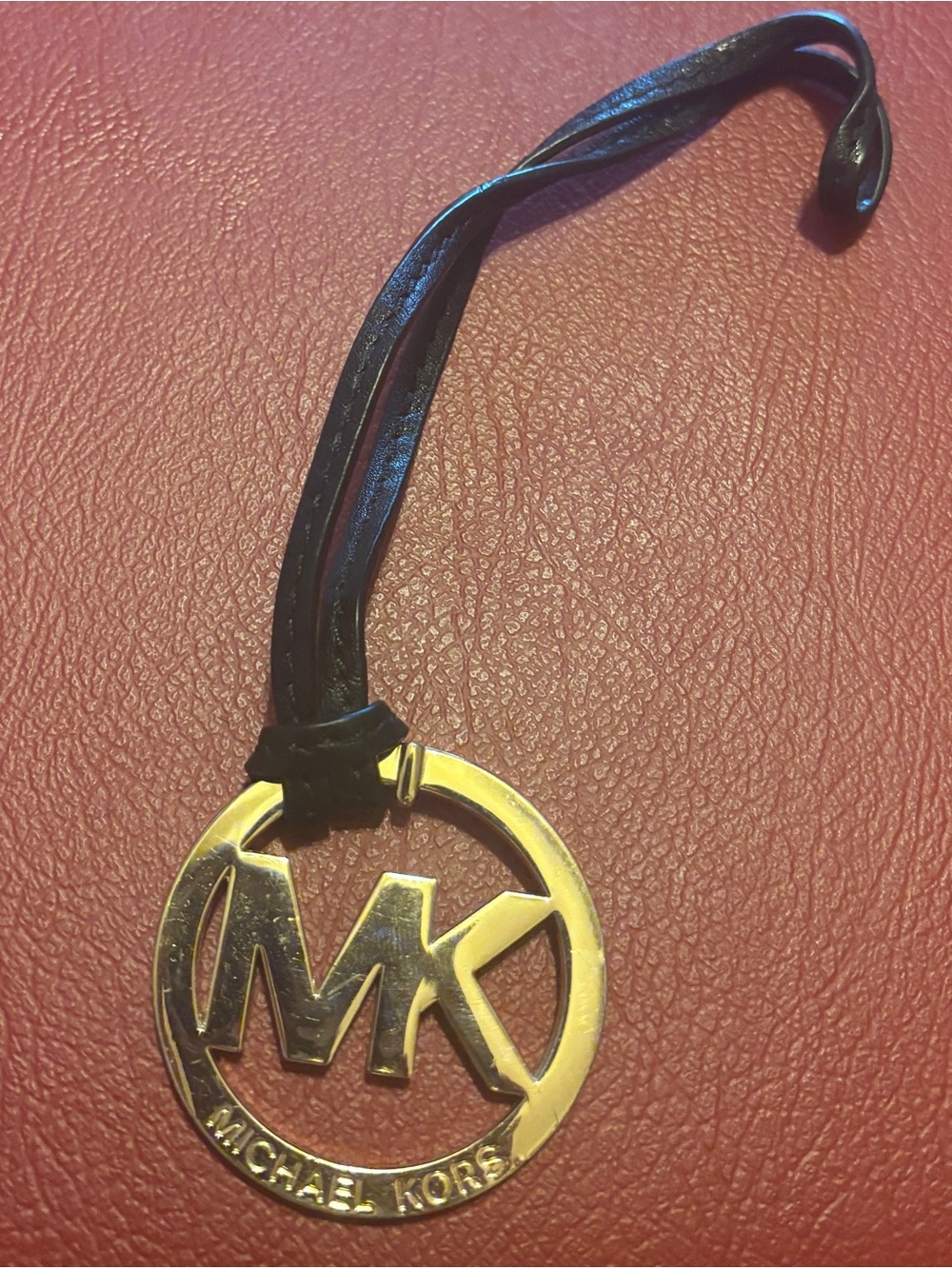 ✴️Michael Kors Black and Gold Bag Charm